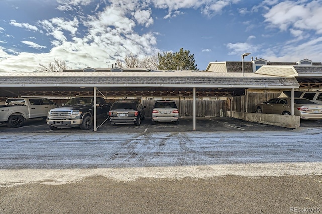 view of parking with a carport