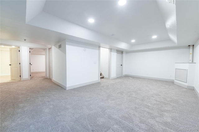 basement with light colored carpet