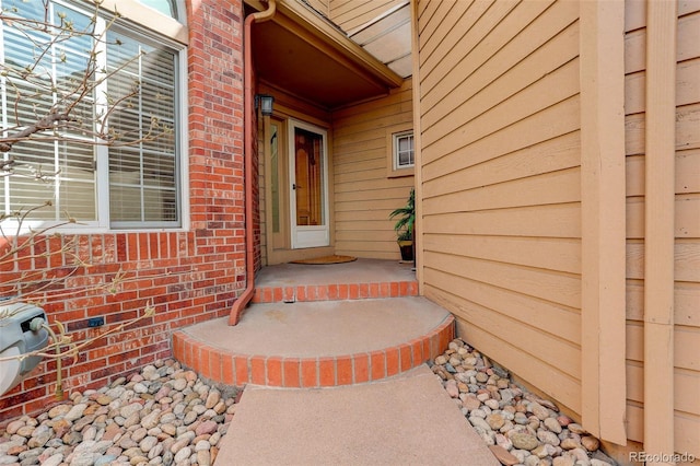 8101 E Dartmouth Ave Unit 22, Denver, CO 80231 - doorway to property with brick siding