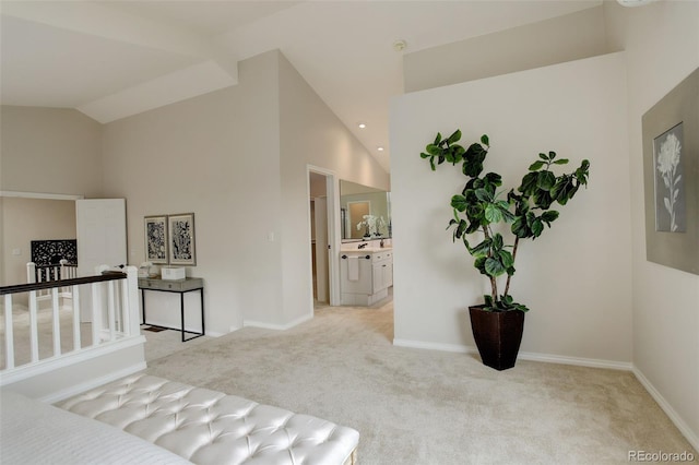 8101 E Dartmouth Ave Unit 22, Denver, CO 80231 - hallway featuring carpet floors, high vaulted ceiling, and baseboards