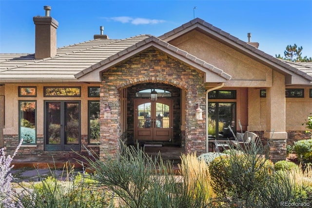 doorway to property with french doors