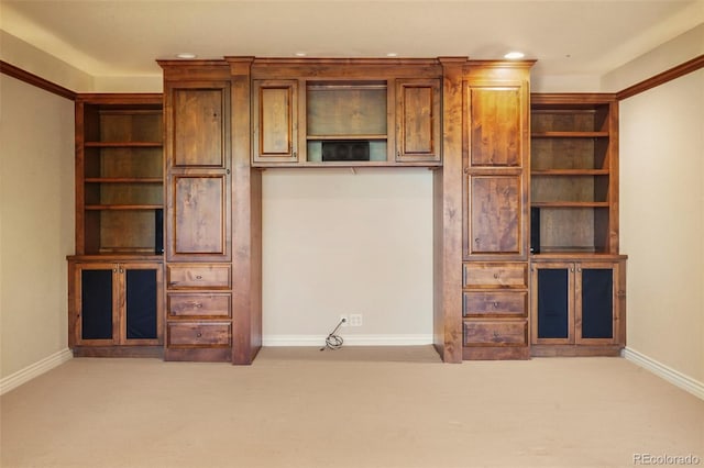 unfurnished living room featuring light colored carpet