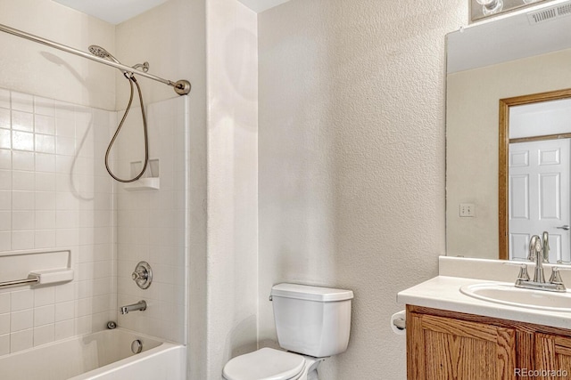 full bathroom featuring vanity, toilet, and shower / washtub combination