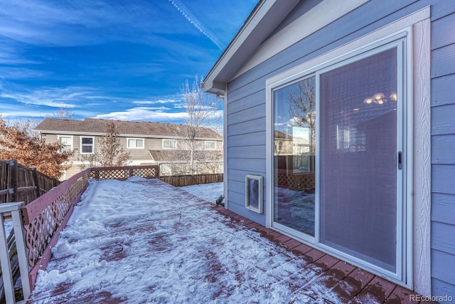 view of snow covered deck