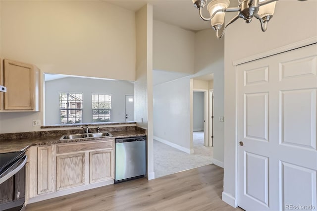 kitchen featuring light hardwood / wood-style flooring, an inviting chandelier, sink, appliances with stainless steel finishes, and light brown cabinets