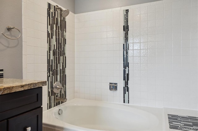 8174 Dudley Cir, Arvada, CO 80005 - bathroom with vanity and bathing tub / shower combination