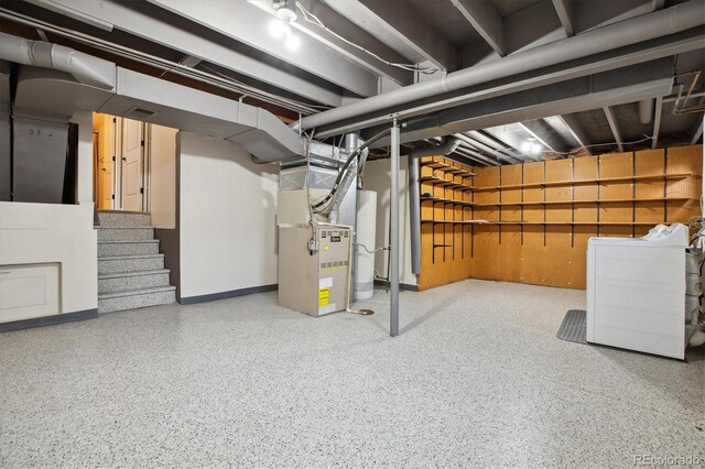 8174 Dudley Cir, Arvada, CO 80005 - finished below grade area with washer / dryer, heating unit, and stairs