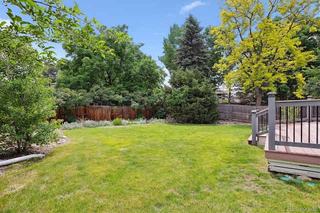 8174 Dudley Cir, Arvada, CO 80005 - view of yard with a wooden deck