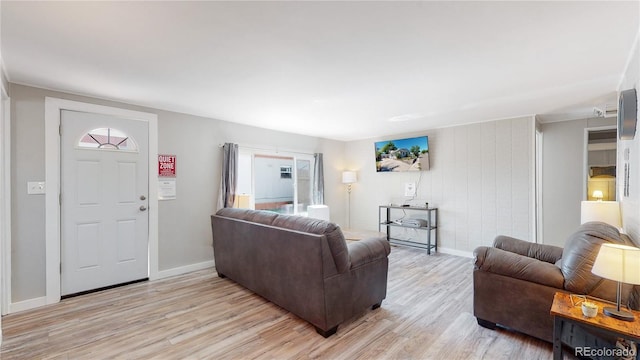 living room with light hardwood / wood-style floors