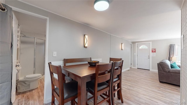 dining space featuring light hardwood / wood-style flooring