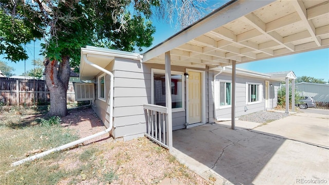 view of property exterior featuring a patio area