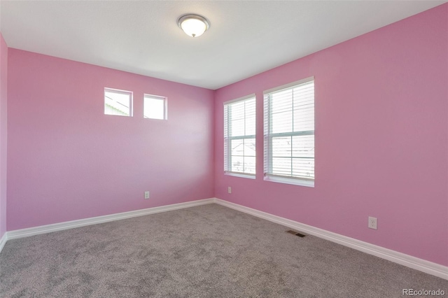 view of carpeted spare room