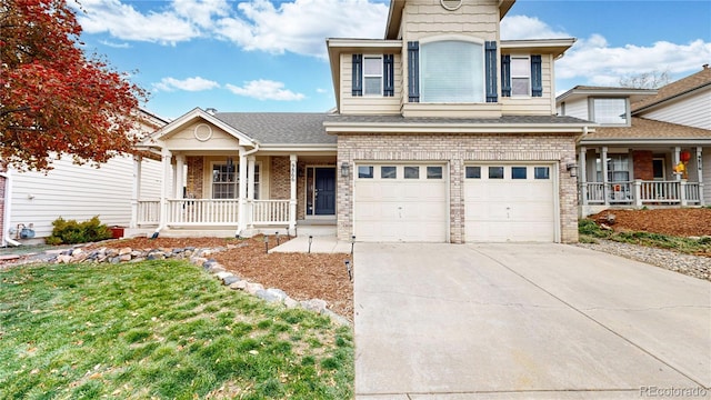 view of front facade featuring a porch and a garage