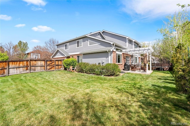 exterior space with a lawn, brick siding, a patio, a fenced backyard, and a pergola