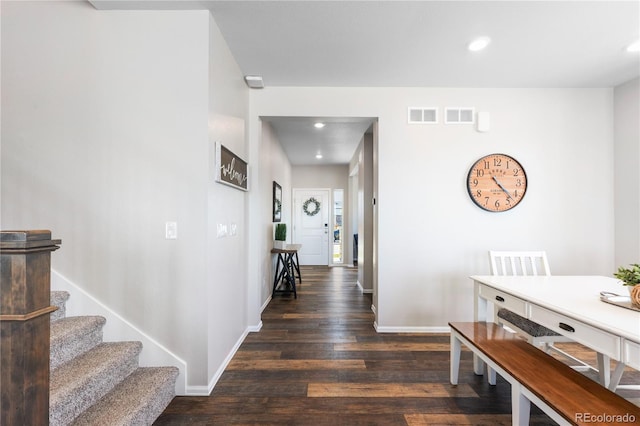 hall featuring dark wood-type flooring