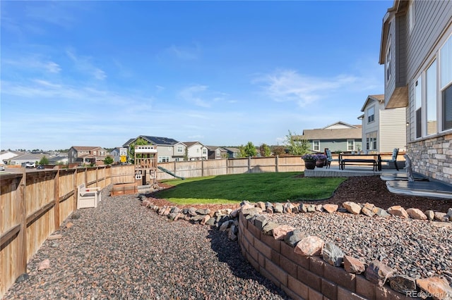 view of yard with a playground and a patio area