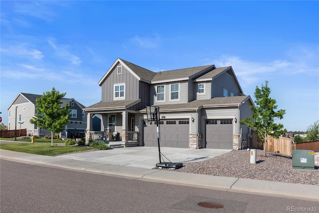 craftsman house featuring a garage and a porch