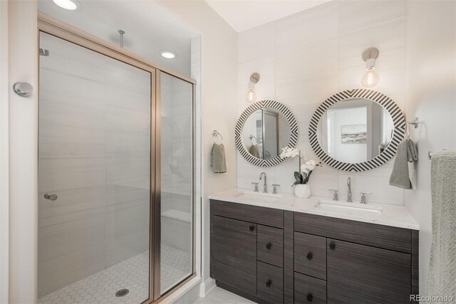 10252 E 58th Ave, Denver, CO 80238 - bathroom featuring a stall shower and double vanity