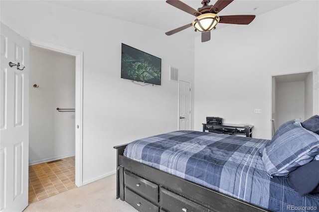 15612 E 96th Way Unit 21D, Commerce City, CO 80022 - bedroom featuring light colored carpet, baseboards, a ceiling fan, and visible vents