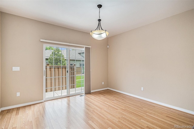 11862 W Stanford Pl, Morrison, CO 80465 - spare room with light wood-style floors and baseboards
