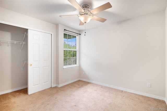 11862 W Stanford Pl, Morrison, CO 80465 - unfurnished bedroom featuring light colored carpet, a closet, and baseboards
