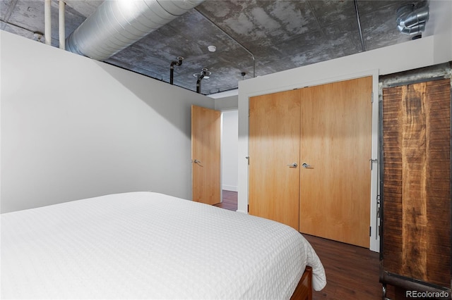 2100 16th St Unit 600, Denver, CO 80202 - bedroom with wood finished floors and a closet