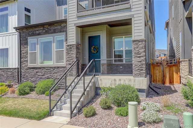 16550 Umatilla Pl, Broomfield, CO 80023 - property entrance featuring stone siding and fence