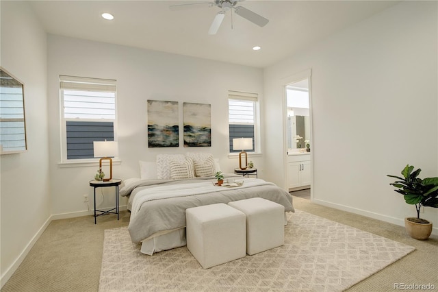 16550 Umatilla Pl, Broomfield, CO 80023 - bedroom featuring light carpet, baseboards, ensuite bathroom, recessed lighting, and a ceiling fan