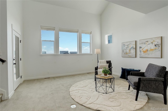 16550 Umatilla Pl, Broomfield, CO 80023 - sitting room with carpet, high vaulted ceiling, and baseboards