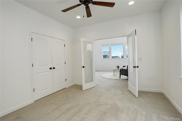 16550 Umatilla Pl, Broomfield, CO 80023 - unfurnished bedroom with french doors, light colored carpet, baseboards, and recessed lighting