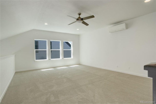 16550 Umatilla Pl, Broomfield, CO 80023 - carpeted empty room with a wall mounted AC, a ceiling fan, baseboards, recessed lighting, and lofted ceiling
