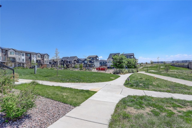 16550 Umatilla Pl, Broomfield, CO 80023 - surrounding community featuring a residential view and a lawn