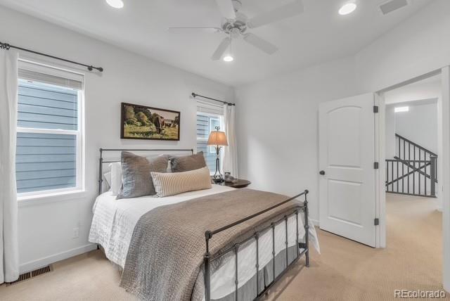 16550 Umatilla Pl, Broomfield, CO 80023 - bedroom featuring light colored carpet, recessed lighting, baseboards, and ceiling fan