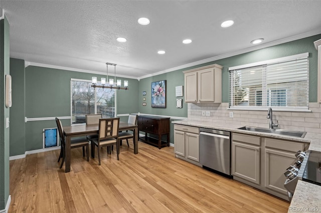 kitchen with gray cabinetry, stove, a sink, stainless steel dishwasher, and light wood-type flooring