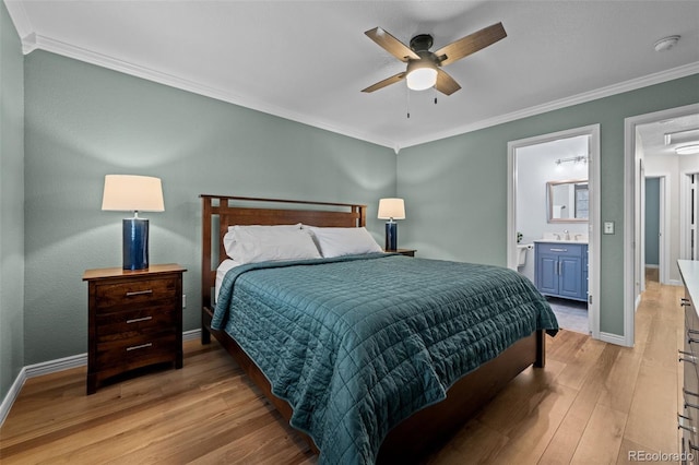 bedroom featuring ornamental molding, baseboards, connected bathroom, and light wood finished floors