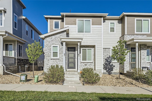 623 S Pitkin Ct, Aurora, CO 80017 - view of property with stone siding