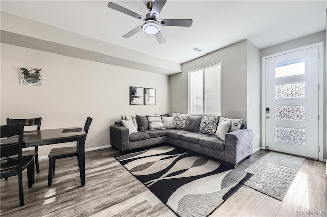 623 S Pitkin Ct, Aurora, CO 80017 - living area with a ceiling fan, baseboards, visible vents, and wood finished floors