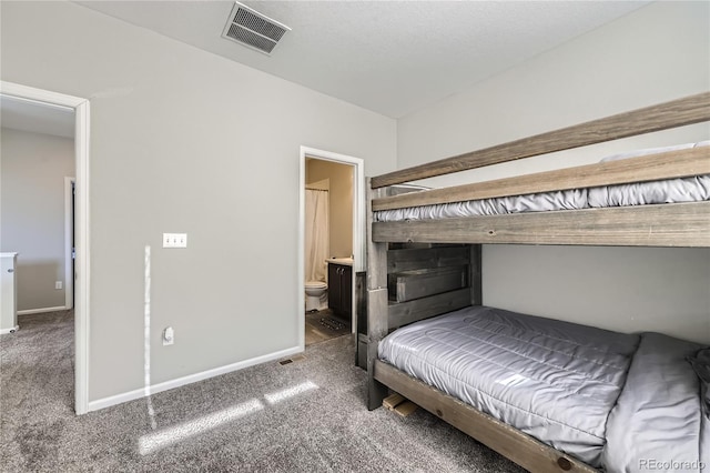 623 S Pitkin Ct, Aurora, CO 80017 - bedroom with baseboards, ensuite bath, visible vents, and carpet