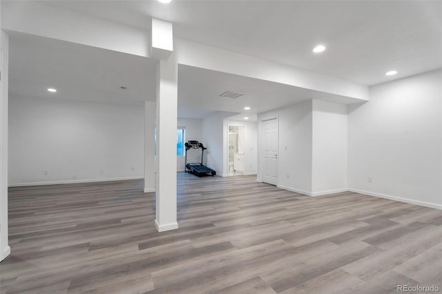 basement with light wood-type flooring