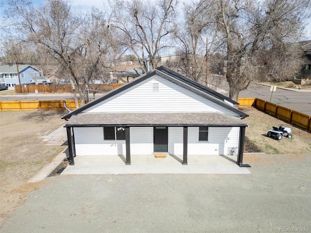 garage with fence