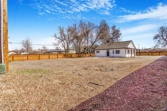 view of yard featuring a fenced backyard