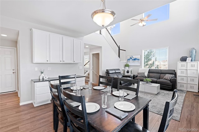 dining room featuring ceiling fan and light hardwood / wood-style flooring