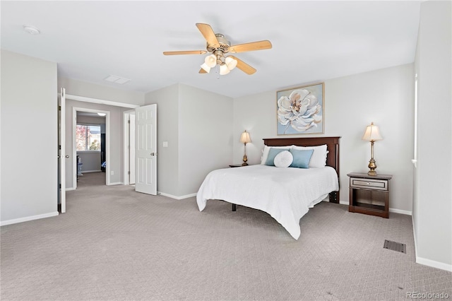 bedroom with light carpet and ceiling fan