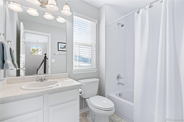 full bathroom featuring vanity, toilet, and shower / tub combo with curtain