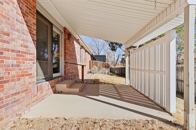 view of patio / terrace featuring entry steps and a fenced backyard