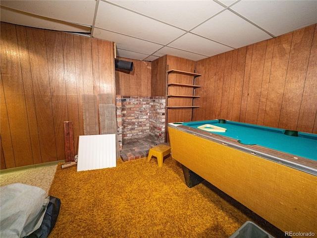 recreation room featuring billiards, wooden walls, carpet flooring, and a paneled ceiling