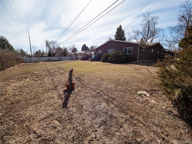 view of yard with fence