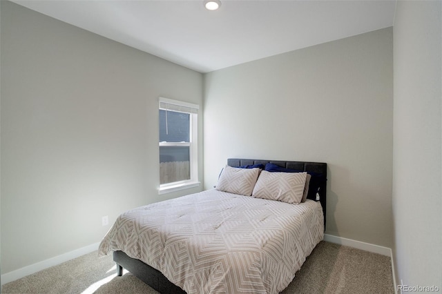 bedroom with carpet floors, recessed lighting, and baseboards