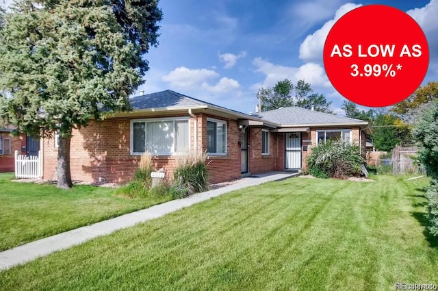 2028 Perry St, Denver, CO 80212 - view of front of house featuring brick siding and roof with shingles