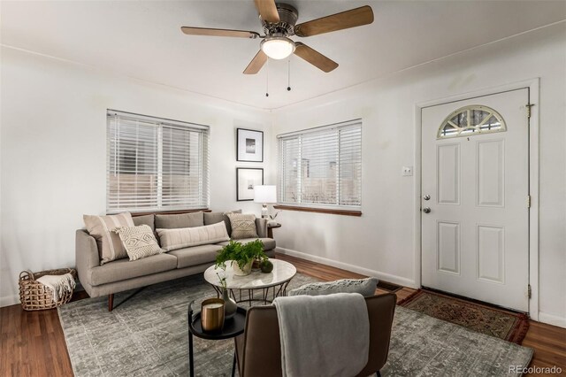 2028 Perry St, Denver, CO 80212 - living area featuring a ceiling fan, wood finished floors, and baseboards